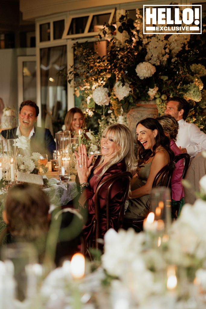 Jo Wood clapping at Tyron's wedding reception