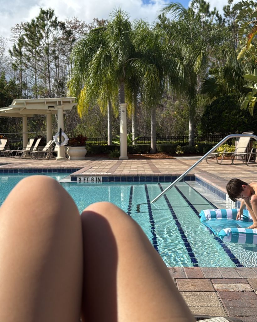 Wolfie and his mother poolside