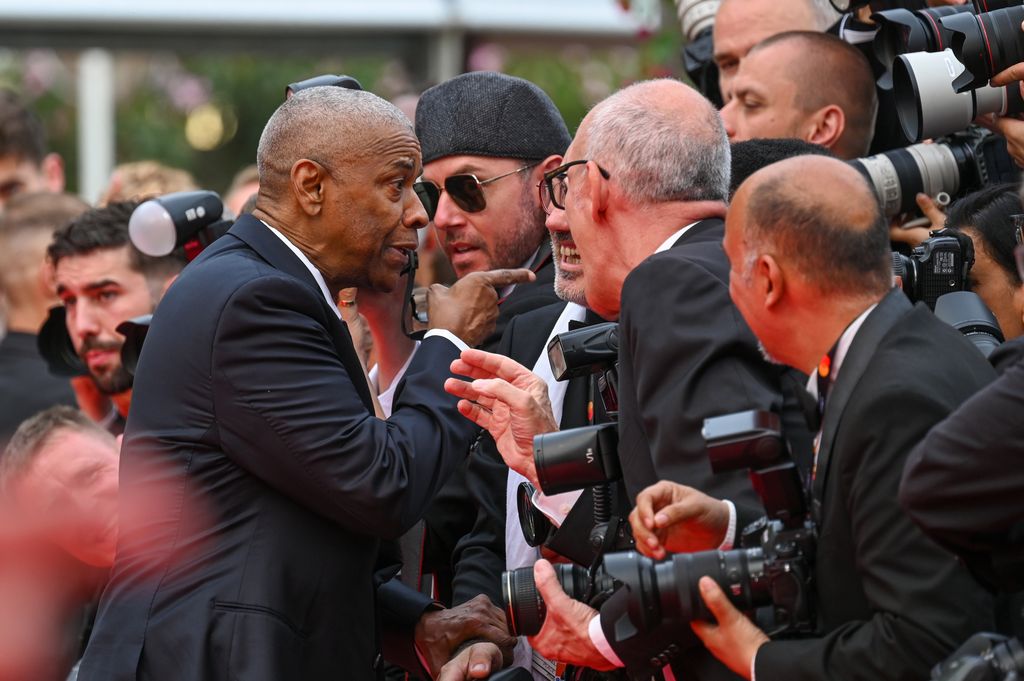denzel washington pointing finger in photographer face on cannes red carpet