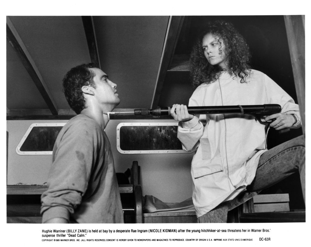 CIRCA 1989: Actor Billy Zane and actress Nicole Kidman on the set of the Warner Bros movie "Dead Calm" circa 1989.