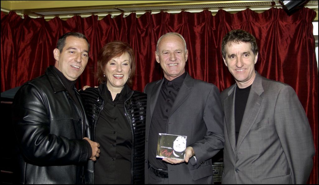 CANADA - OCTOBER 11:  Celine Dion's sister Claudette launches her own record "Claudette Dion sings Edith Piaf" at the Montreal Casino In Montreal, Canada On October 11, 2002-Claudette Dion with her brothers Clement, Paul and Jacques.  (Photo by Michel PONOMAREFF/PONOPRESSE/Gamma-Rapho via Getty Images)