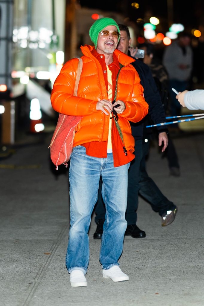brad pitt in orange puffer