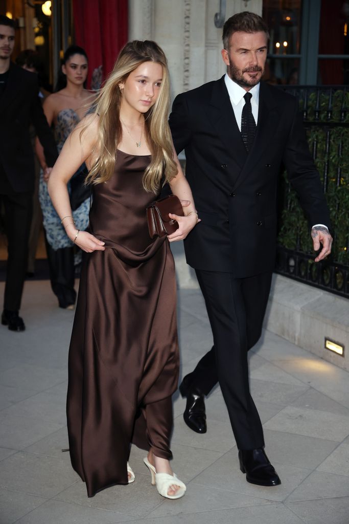 David Beckham and Harper Beckham leaving their hotel to head to the Victoria Beckham show during the Womenswear Fall/Winter 2025/2026 as part of Paris Fashion Week on March 07, 2025 in Paris, France.