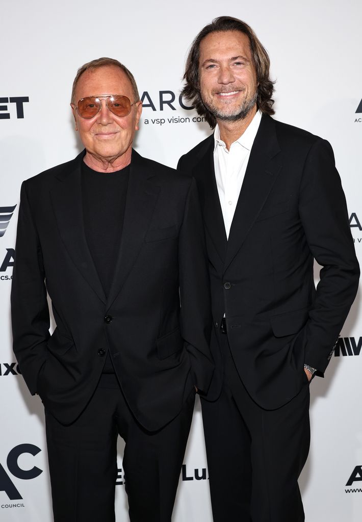 Michael Kors and Lance Le Pere in black outfits