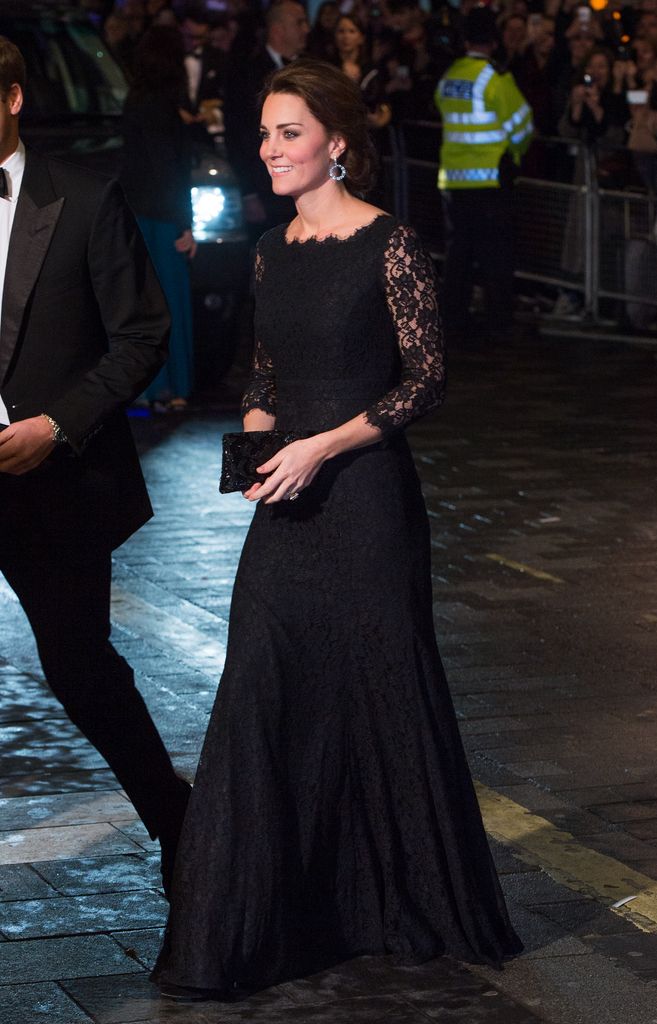 Catherine, Duchess of Cambridge attends The Royal Variety Performance in 2014 wearing a long black dress