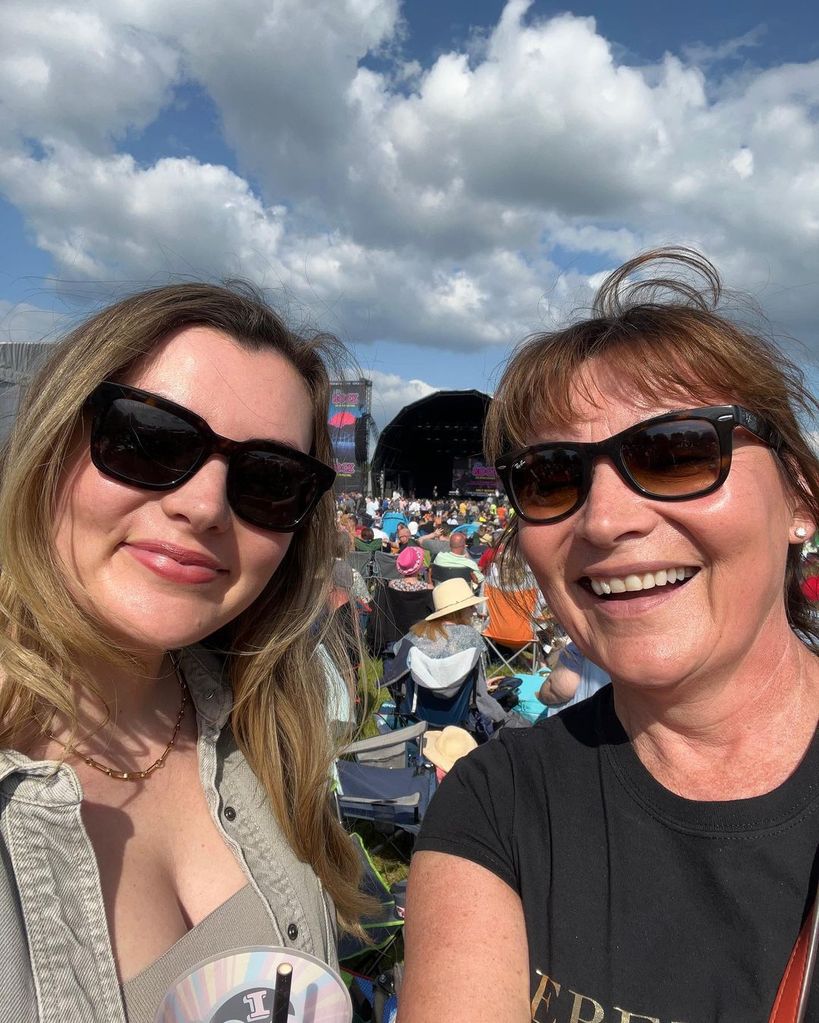 lorraine kelly and daughter rosie smiling at festival 