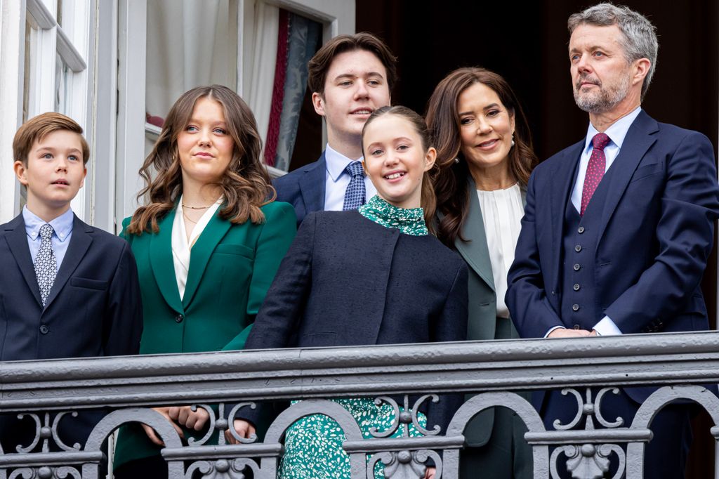 Frederik and Mary with their children on palace balcony in 2023