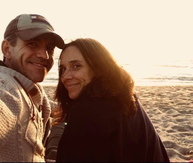 Brian and Kelly pose for selfie on beach front