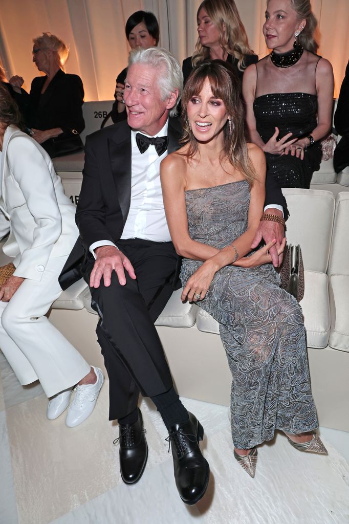 Richard and Alejandra Silva attend the Giorgio Armani fashion show 