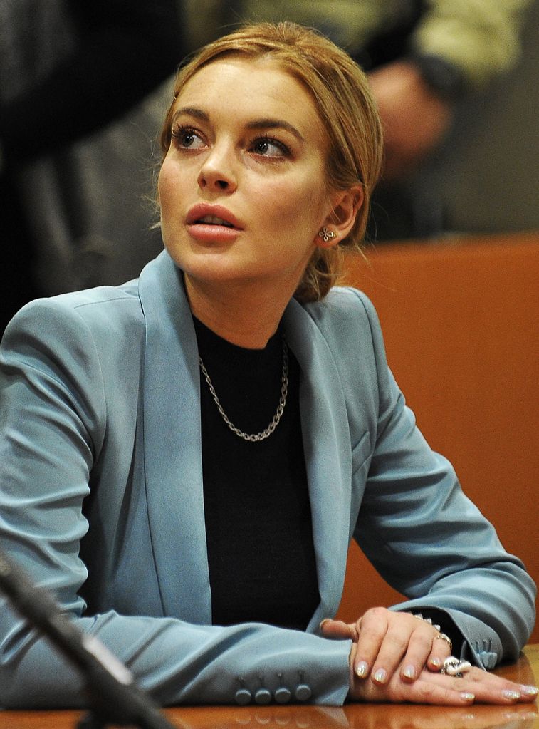 Actress Lindsay Lohan attends a probation progress report hearing at Superior Court in Los Angeles, California, March 29, 2012. 