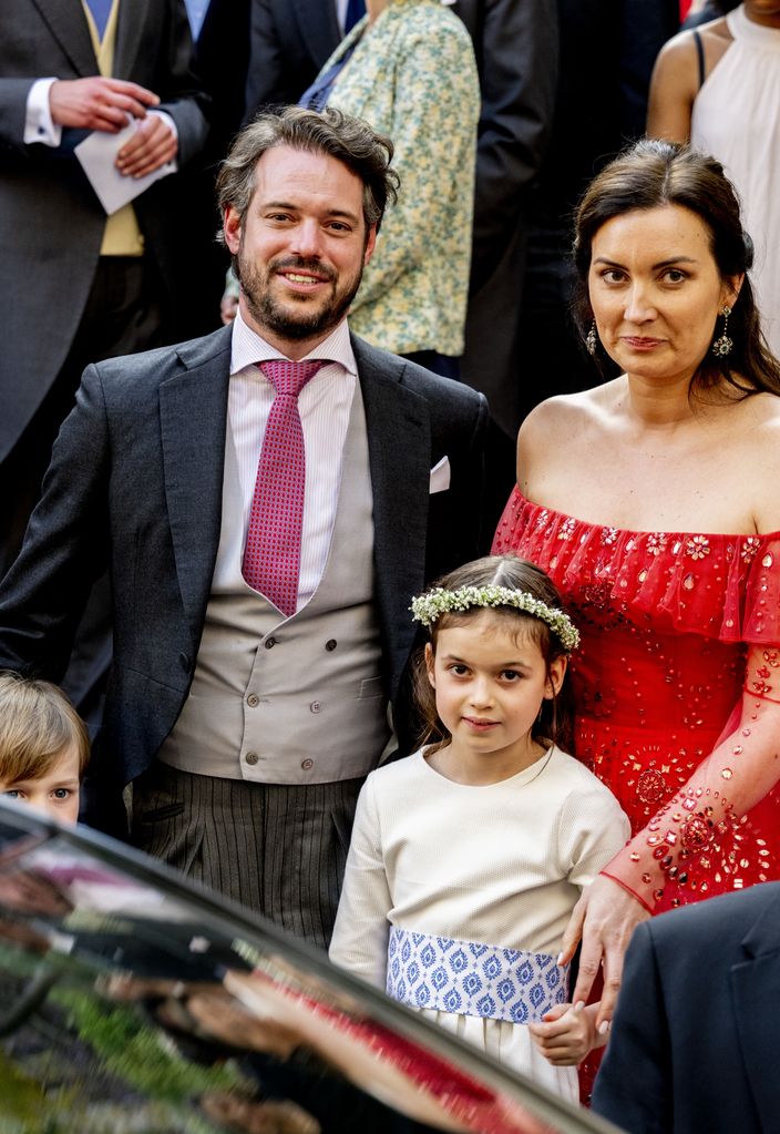 Prince Felix and Prince Liam standing with Princess Claire and Princess Amalia