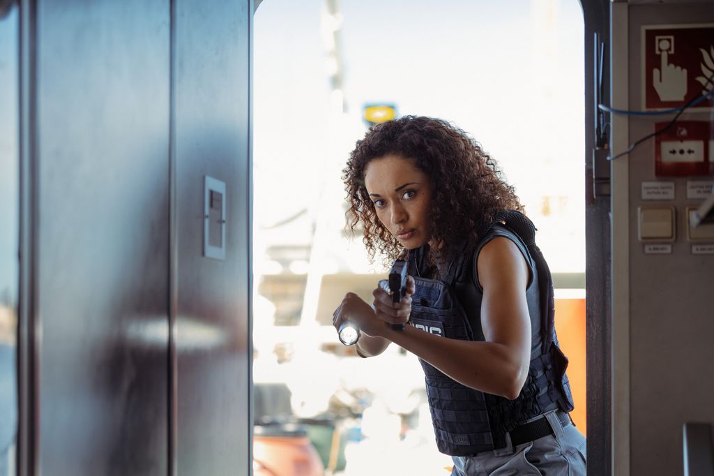 Olivia Swann as NCIS Special Agent Captain Michelle Mackey in NCIS: Sydney 