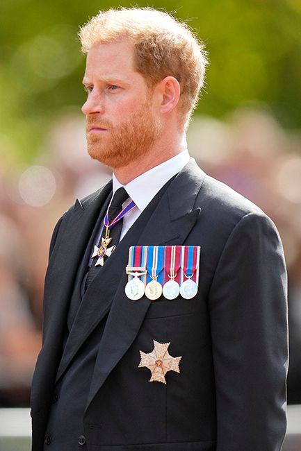 prince harry mourning suit