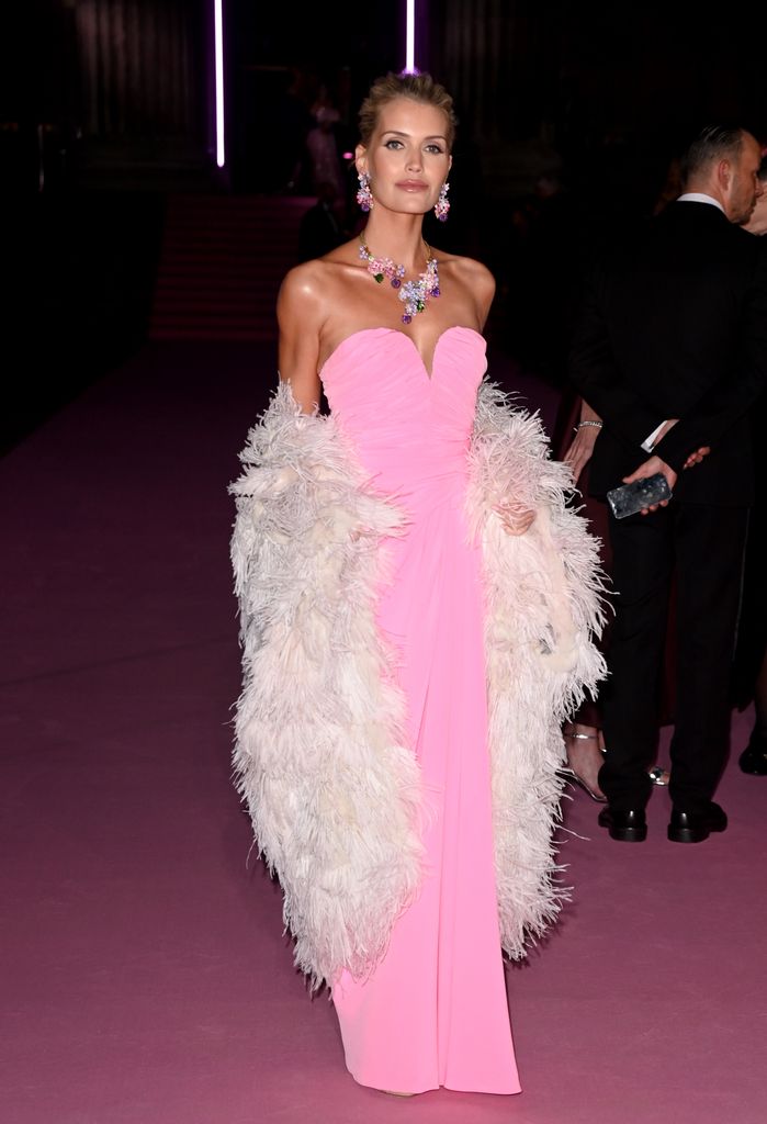 Lady Kitty Spencer in a pink dress and fur coat