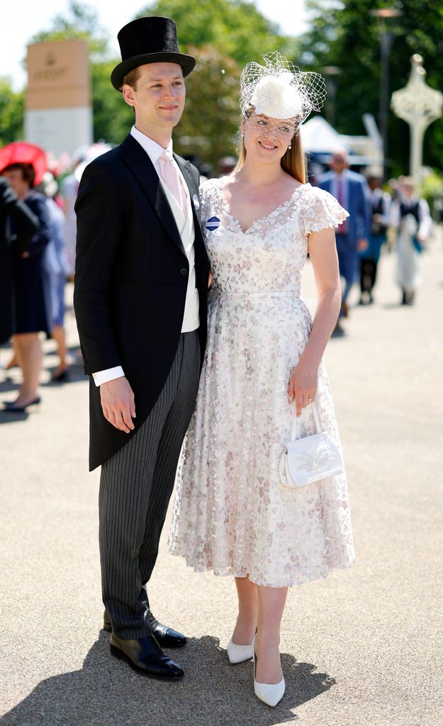 Flora Vesterberg in a white lacy dress with her husband at Royal Ascot in 2022 