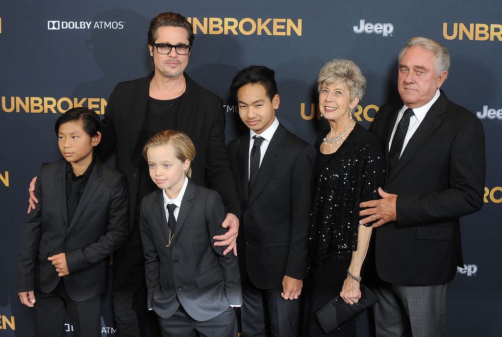 Brad Pitt, kids Maddox Jolie-Pitt, Shiloh Jolie-Pitt, Pax Jolie-Pitt and his parents arrive at the Los Angeles premiere of "Unbroken" at The Dolby Theatre on December 15, 2014 in Hollywood, California