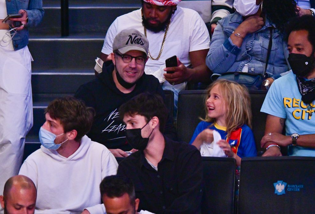 Jason Sudeikis with his son Otis at a basketball game in 2021