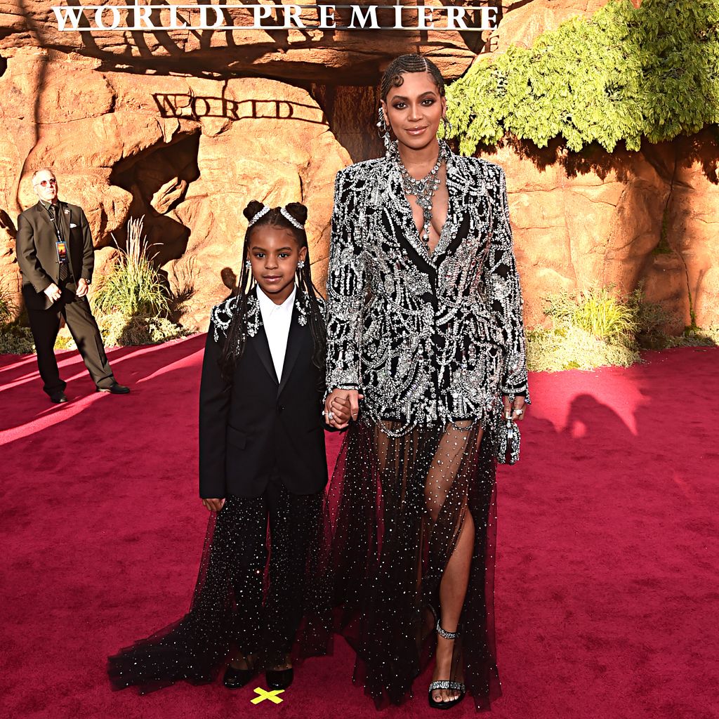 HOLLYWOOD, CALIFORNIA - JULY 09: (EDITORS NOTE: Retransmission with alternate crop.) Blue Ivy Carter (L) and Beyonce Knowles-Carter attend the World Premiere of Disney's "THE LION KING" at the Dolby Theatre on July 09, 2019 in Hollywood, California. (Photo by Alberto E. Rodriguez/Getty Images for Disney)