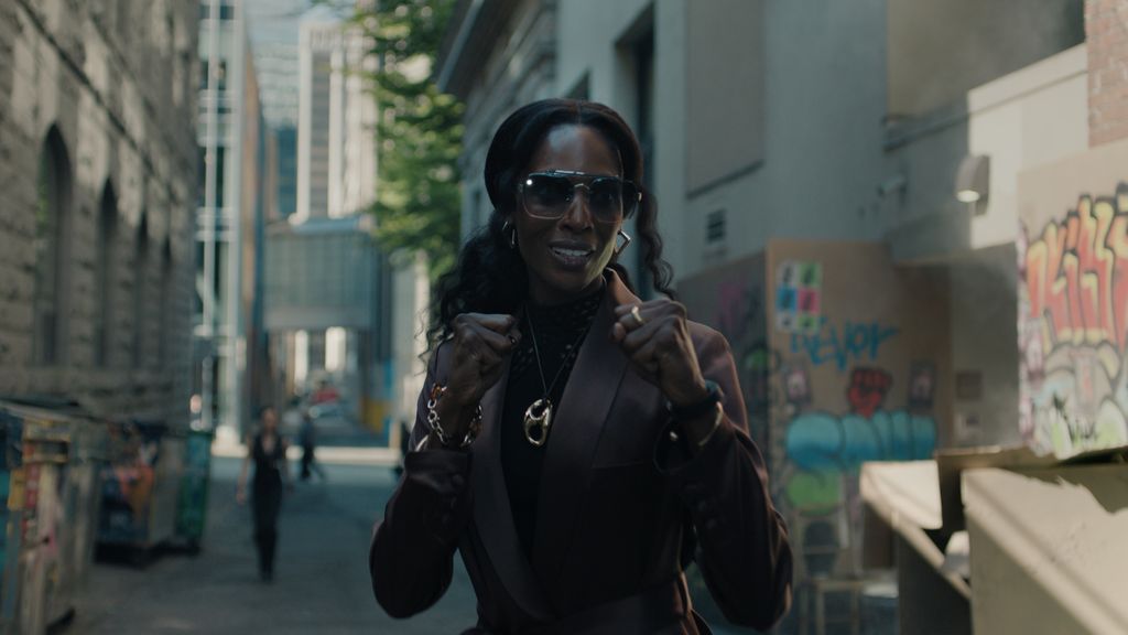 Zainab Johnson adopting a fighting pose in Upload