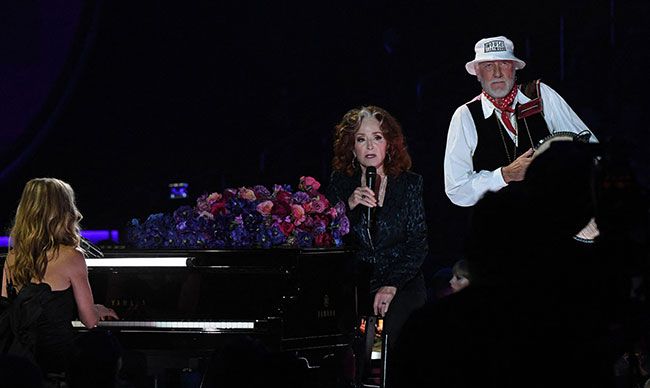 Sheryl Crow, Bonnie Raitt and Mick Fleetwood on stage at the Grammys