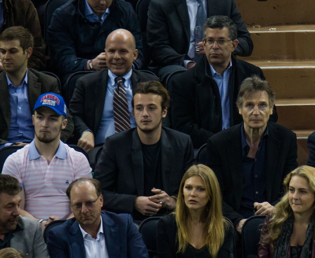 Liam Neeson and his sons Daniel Neeson and Micheal Neeson attend New York Rangers Vs. Boston Bruins game 