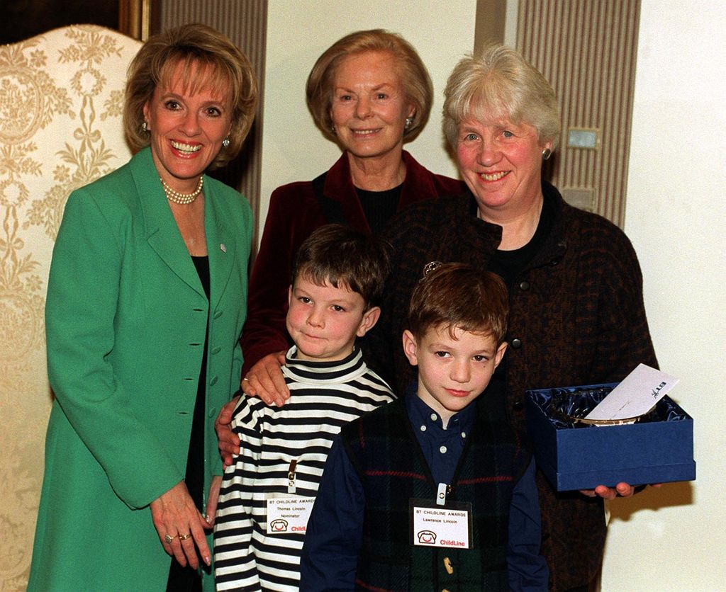 ChildLine chairperson Esther Rantzen and the Duchess of Kent (C), with Inga Croy, from Orkney, and Thomas Lincoln, 7, from Inveress (L) who nominated Mrs Croy for her award, and his brother Lawrence, during the 1999 BT ChildlLine Awards in London.