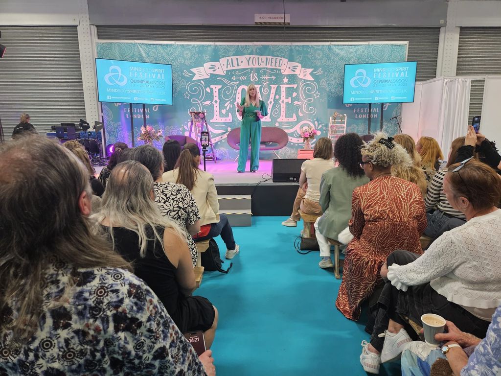 Theresa speaking on stage
