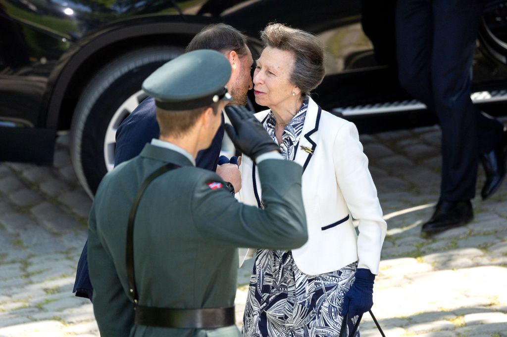 Princess Anne kisses Crown Prince Haakon