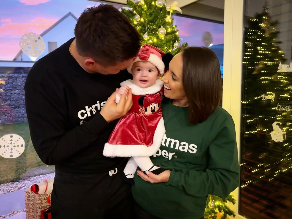 Aljaz Skorjanec and Janette Manrara's baby daughter Lyra dressed as Santa 