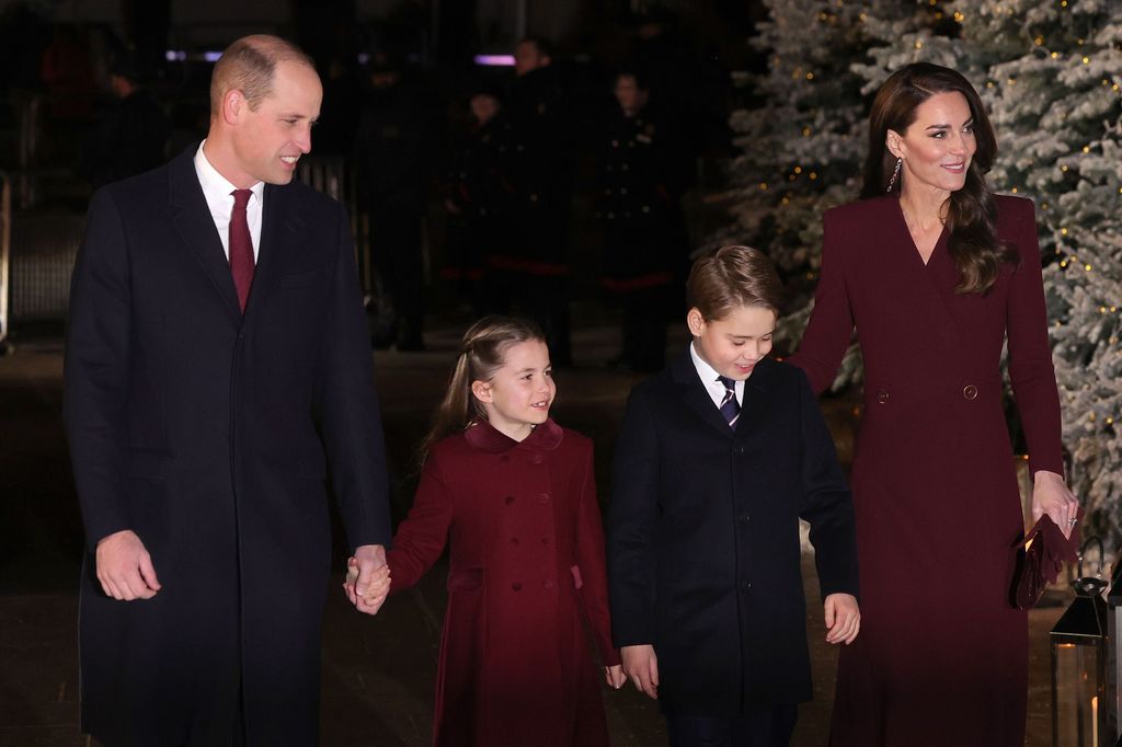 Prince William and Princess Kate walking with Princess Charlotte and Prince George