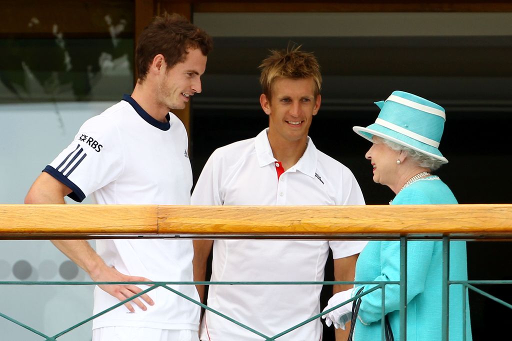 Queen Elizabeth II talking to Andy Murray and Jarkko Nieminen at Wimbledon in 2010