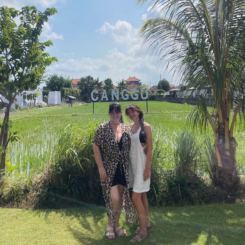 mother and daughter posing in Indonesia