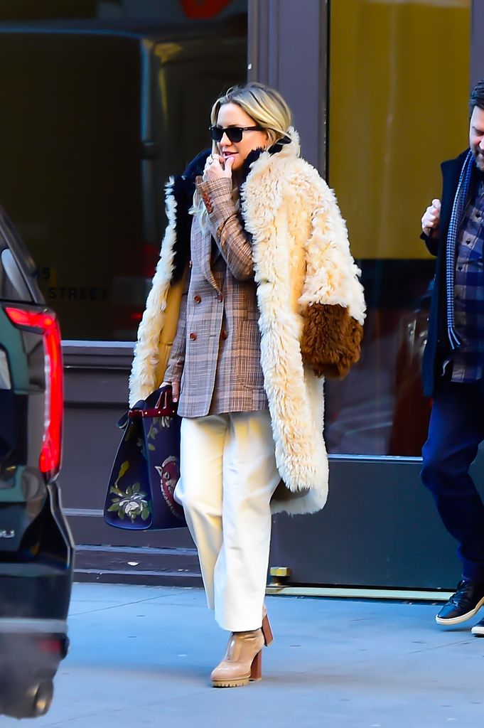 Kate Hudson is so chic in killer boots and incredible 70s coat | HELLO!