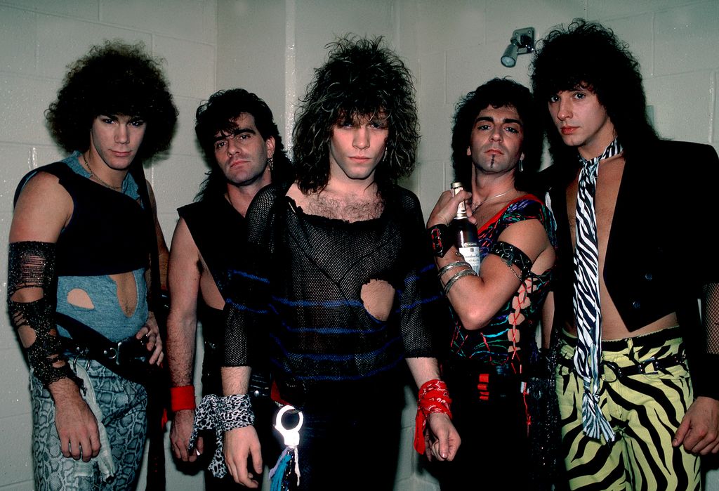 Portrait of American rock band Bon Jovi backstage before a performance at the Rosemont Horizon, Rosemont, Illinois, May 20, 1984. Pictured are, from left, David Bryan, Tico Torres, Jon Bon Jovi, Alec John Such, and Richie Sambora.