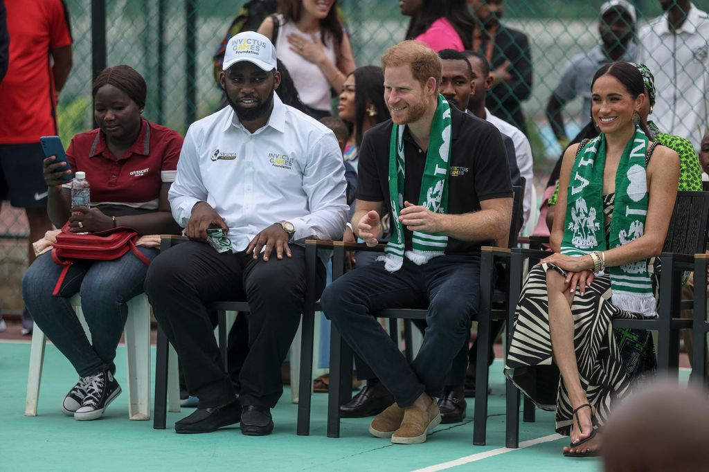Prince Harry and Meghan attend a sitting volleyball match at Nigeria Unconquered, a local charity organisation that supports wounded, injured, or sick servicemembers, in Abuja 