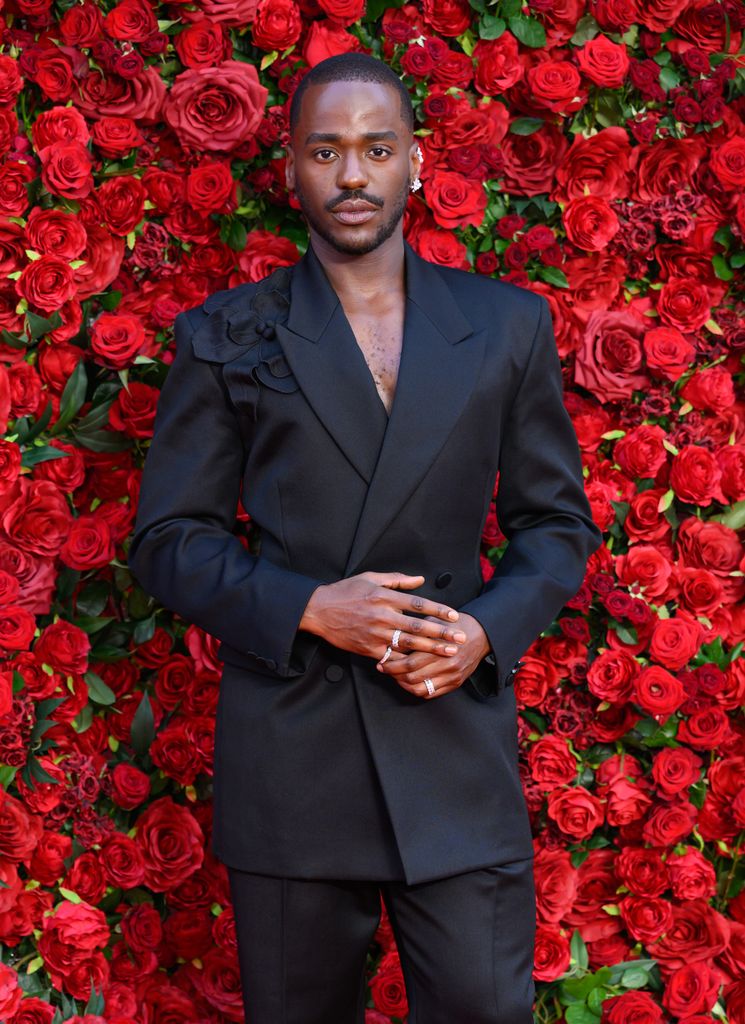 A photo of Ncuti Gatwa wearing a black suit