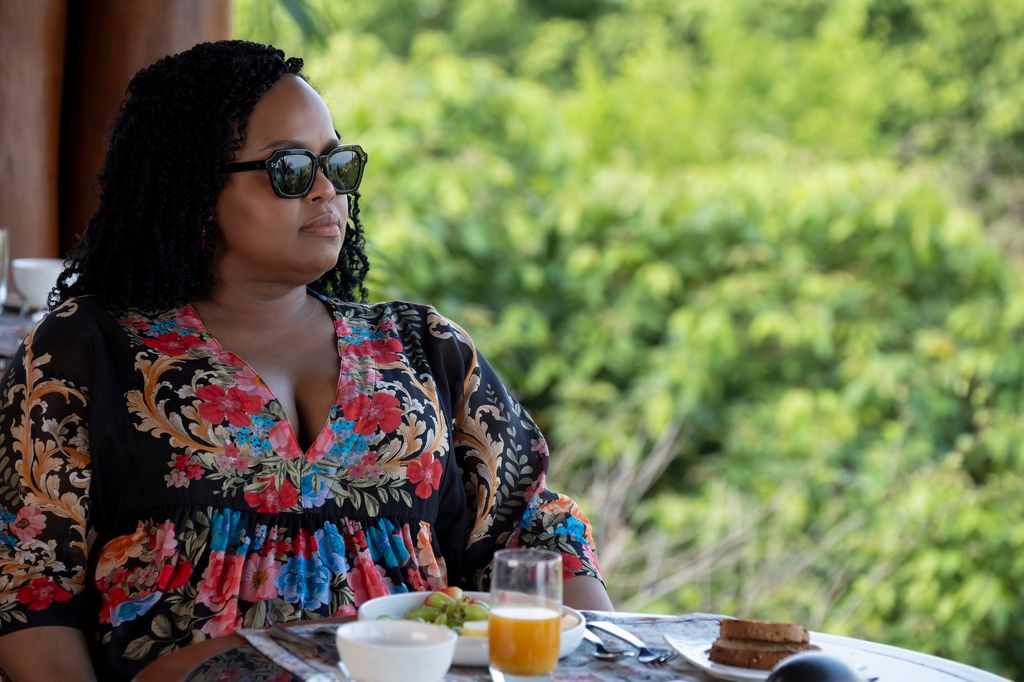 natasha rothwell as belinda in white lotus black floral dress