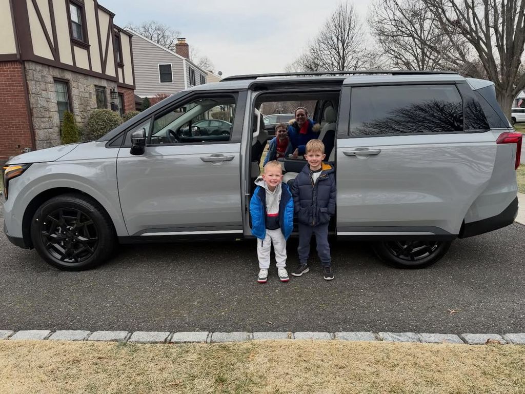 Dylan Dreyer and Brian Fichera's three sons join her while posing with their new Kia Carnival, shared on Instagram