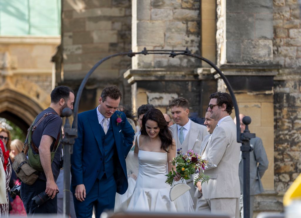 How Downton Abbey's Michelle Dockery's dramatic pleated wedding dress ...