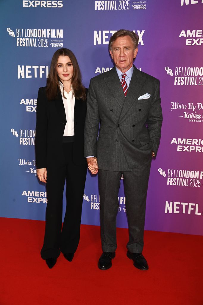 Rachel Weisz and Daniel Craig on red carpet in suits