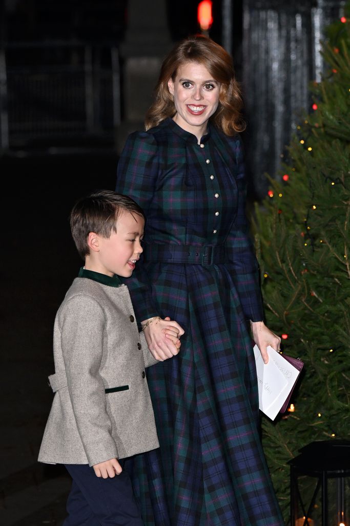  Christopher Woolf and Princess Beatrice attend The "Together At Christmas" Carol Service at Westminster Abbey on December 08, 2023 in London, 