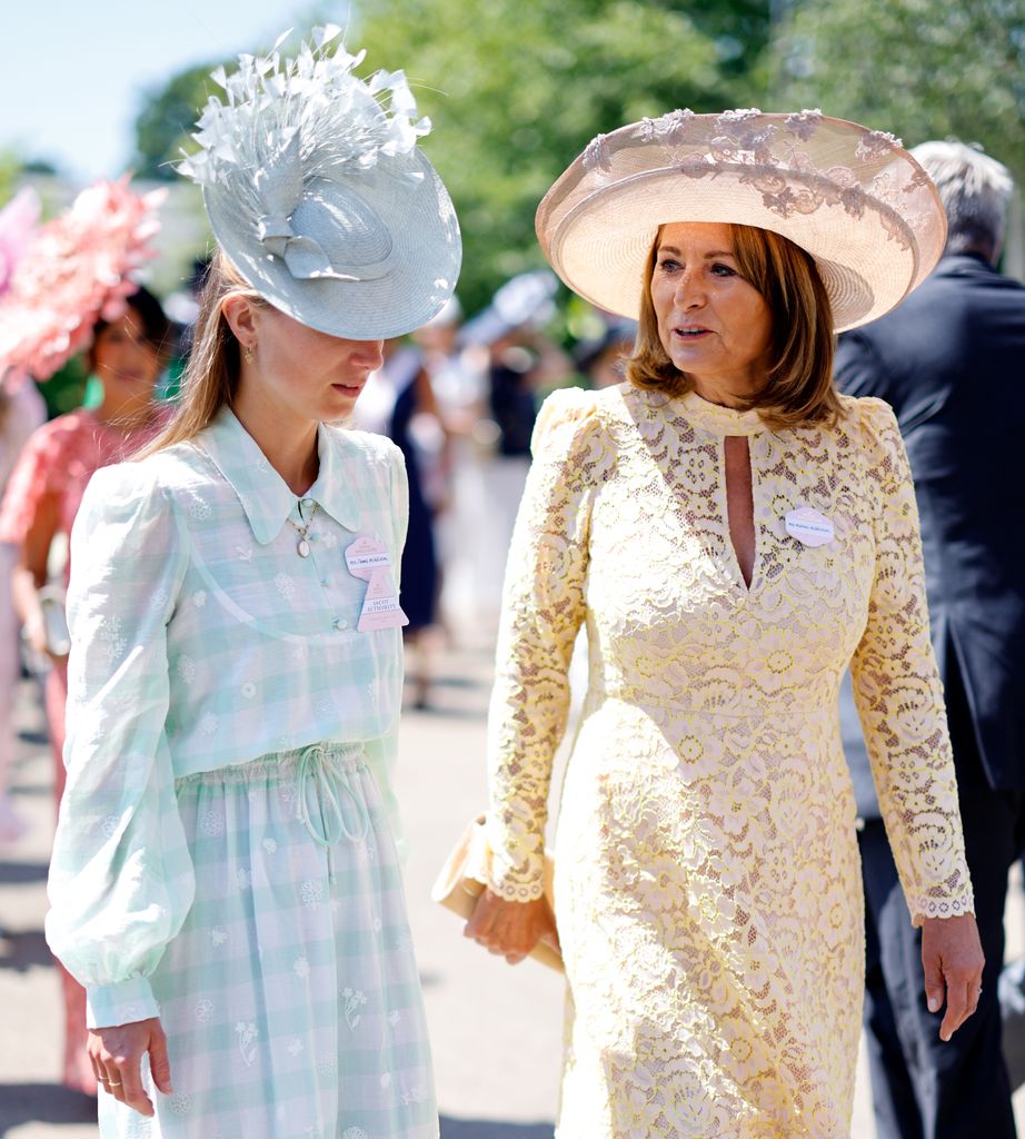 Alizee in green dress and hat with carole middleton in yellow