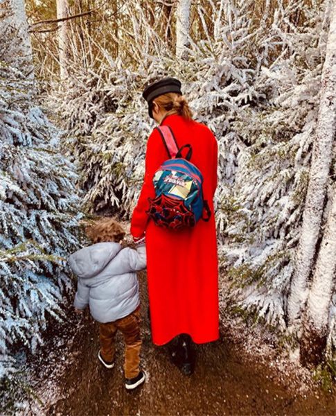 cheryl and son bear in lapland uk