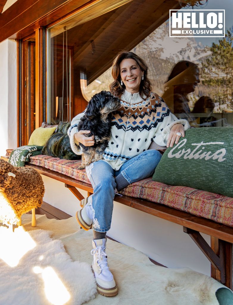 Maria Paola Merloni posing with pet dog