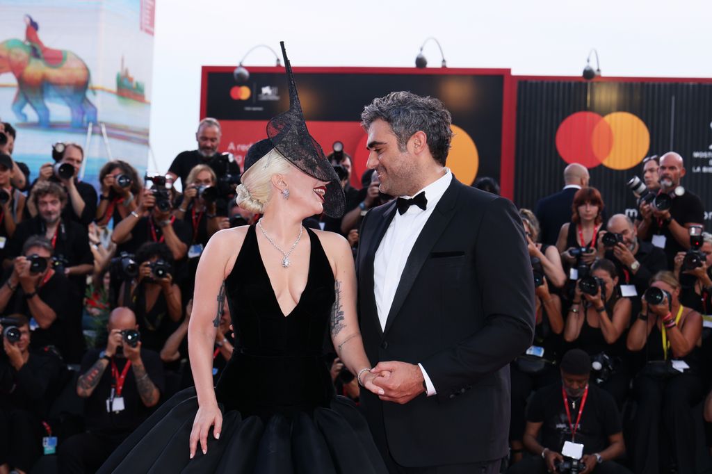  Lady Gaga and Michael Polansky attend the "Joker: Folie Ã  Deux" red carpet during the 81st Venice International Film Festival at Sala Grande on September 04, 2024 in Venice, Italy