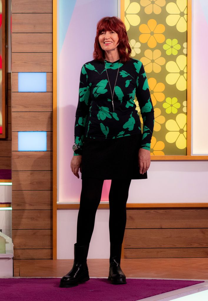 Janet Street-Porter in a mini skirt with chunky boots