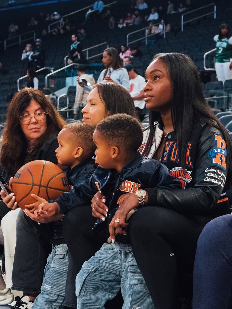 Shannon sitting on the sidelines with her twin sons