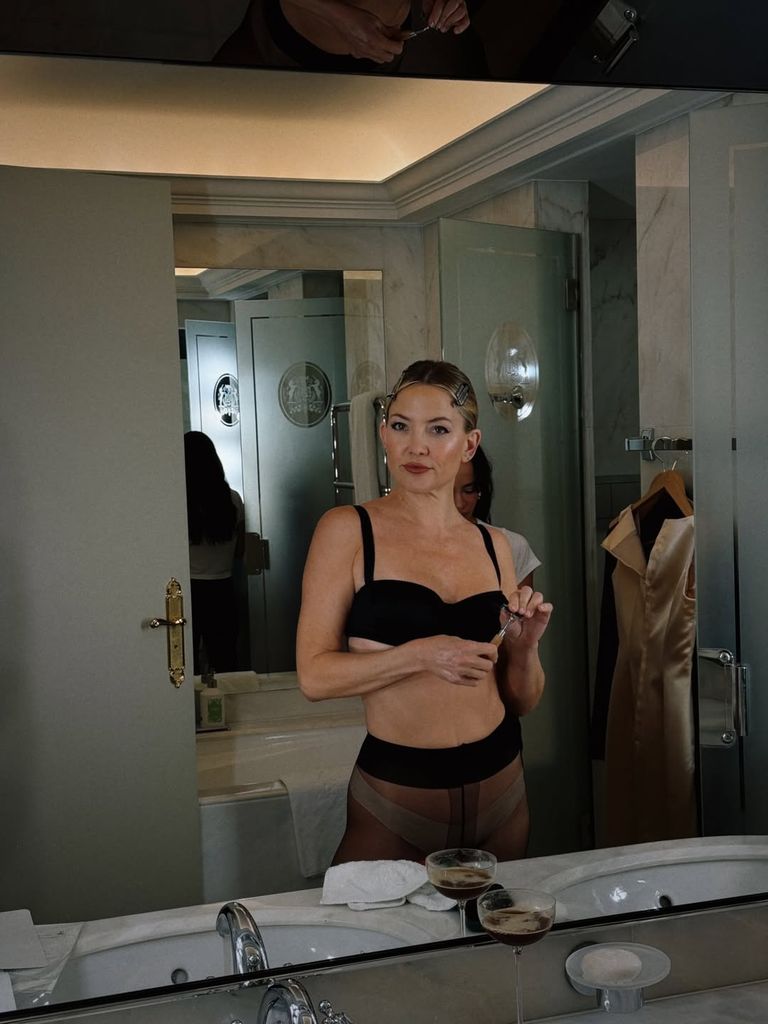 Kate Hudson in black bra and stockings