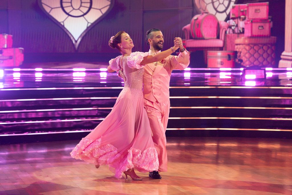 Whitney Leavitt and Mark Ballas perform during Wicked Night on DWTS