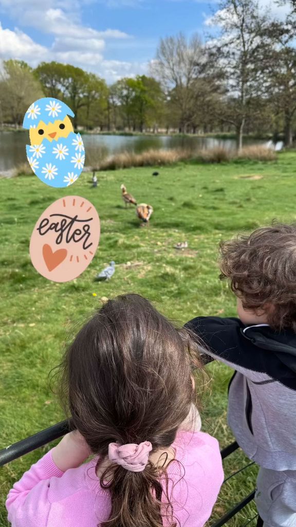 brother and sister looking at ducks and pond 